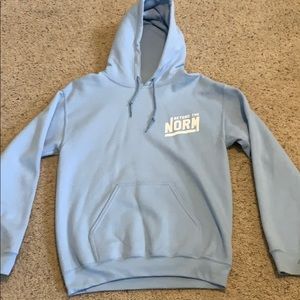 Small blue Sam Golbach “Beyond The Norm” Merch